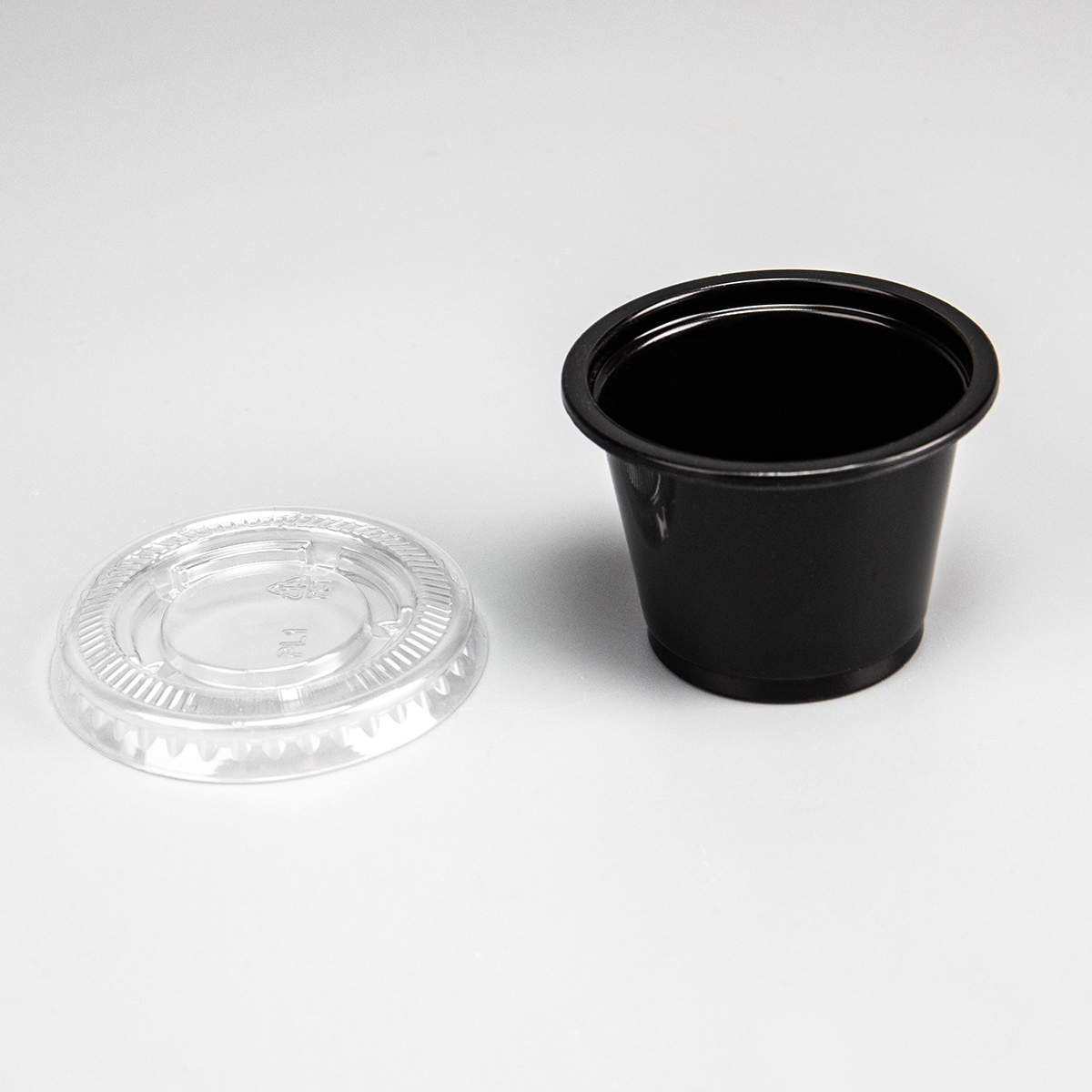 Tasse à sauce en plastique PP transparent ou noir de 0,5 oz